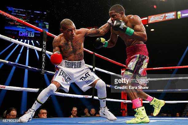Steven Upsher is hit by a left from Ashley Theophane during their junior welterweight fight at MGM Grand Garden Arena on September 12, 2015 in Las...