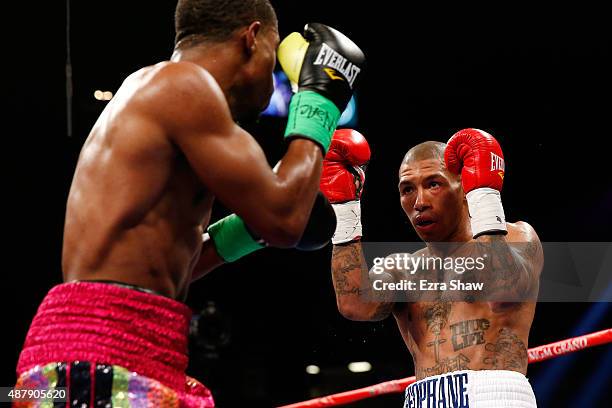 Ashley Theophane and Steven Upsher square off during their junior welterweight fight at MGM Grand Garden Arena on September 12, 2015 in Las Vegas,...