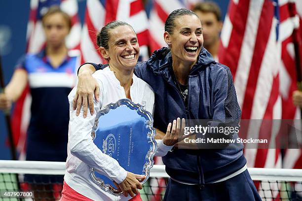 Flavia Pennetta of Italy and Roberta Vinci of Italy are interviewed by Broadcaster Robin Roberts after their Women's Singles Final match on Day...