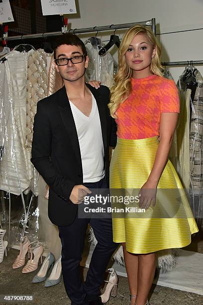Christian Siriano and Olivia Holt pose backstage just before the start of the Christian Siriano show during Spring 2016 New York Fashion Week at...