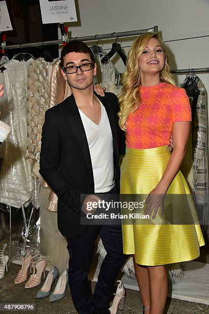 Christian Siriano and Olivia Holt pose backstage just before the start of the Christian Siriano show during Spring 2016 New York Fashion Week at...