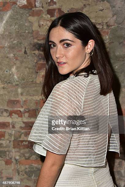 Isabelle Fuhrman poses backstage just before the start of the Christian Siriano show during Spring 2016 New York Fashion Week at ArtBeam on September...