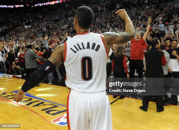 Damian Lillard of the Portland Trail Blazers celebrates after hitting a last second shot to win the game in the fourth quarter of Game Six of the...