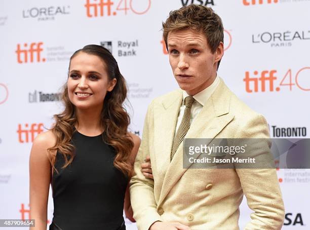 Actors Alicia Vikander and Eddie Redmayne attends "The Danish Girl" premiere during the 2015 Toronto International Film Festival at the Princess of...