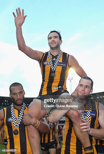 Jordan Lewis of the Hawks is chaired off the ground in his 200th match during the round seven AFL match between the Hawthorn Hawks and the St Kilda...