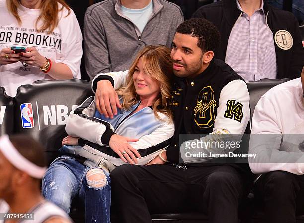 Ellen Pompeo and Drake attend the Toronto Raptors vs Brooklyn Nets game at Barclays Center on May 2, 2014 in the Brooklyn borough of New York City.