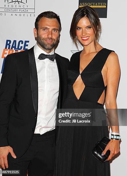 Jamie Mazur and Alessandra Ambrosio attend the 21st Annual Race To Erase MS Gala held at the Hyatt Regency Century Plaza on May 2, 2014 in Century...