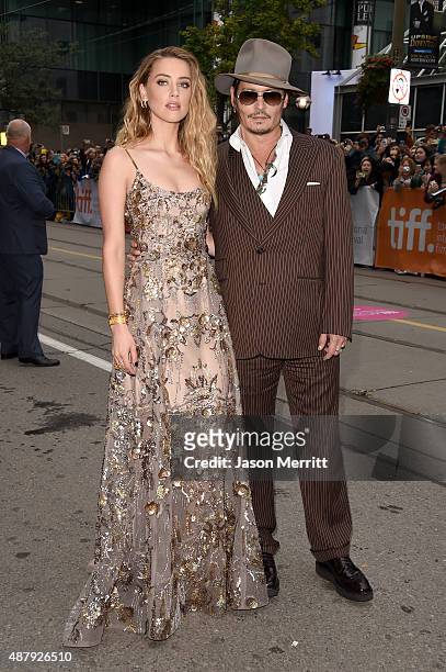 Actress Amber Heard and actorJohnny Depp attend "The Danish Girl" premiere during the 2015 Toronto International Film Festival at the Princess of...