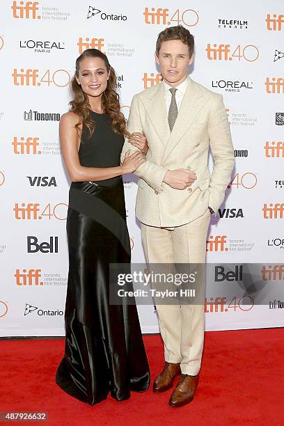 Alicia Vikander and Eddie Redmayne attend the premiere of "The Danish Girl" at Princess of Wales Theatre during the 2015 Toronto International Film...