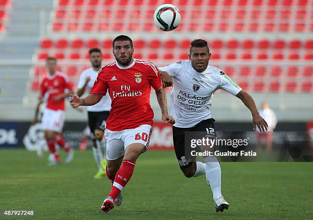 Benfica II's defender Pedro Rebocho with Academica de Viseu's forward Yuri in action during the Primeira Liga match between SL Benfiva II and...