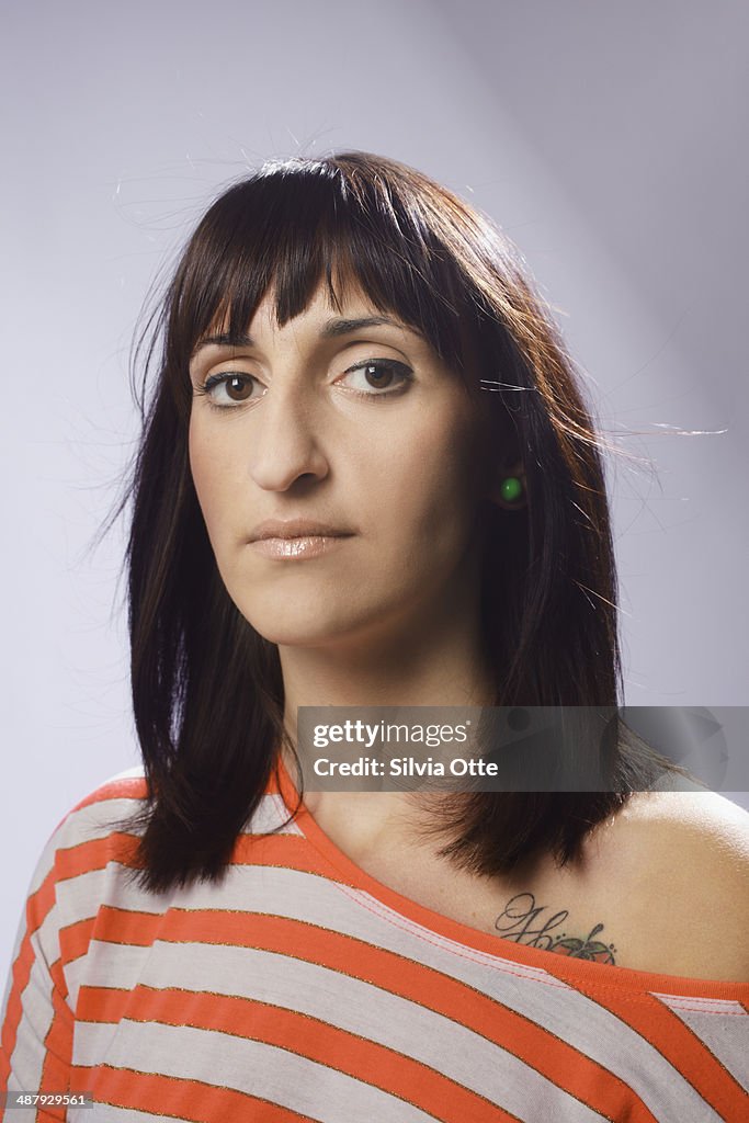 Portrait of young woman with striped t-shirt