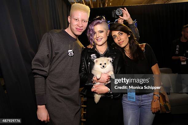 Model Shaun Ross and TV personality Kelly Osbourne with her dog Polly pose with designer Francesca Liberatore backstage at Francesca Liberatore...