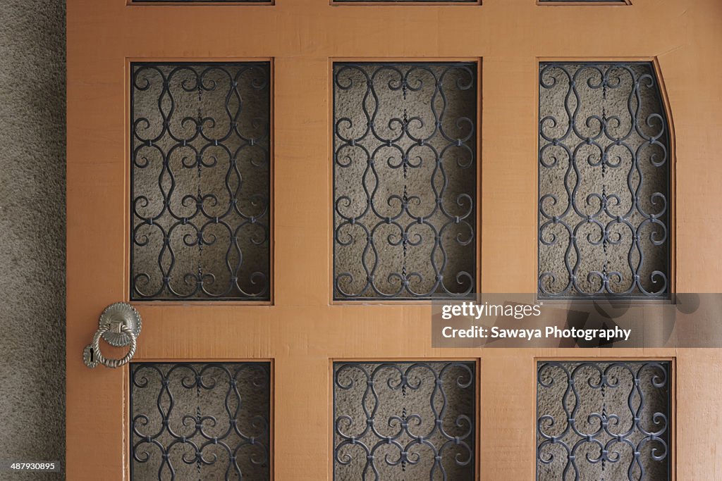 A wrought iron garage door