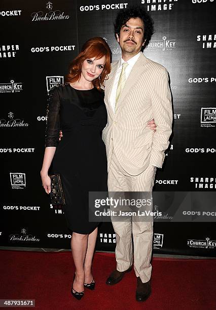 Actress Christina Hendricks and actor Geoffrey Arend attend the premiere of "God's Pocket" at LACMA on May 1, 2014 in Los Angeles, California.