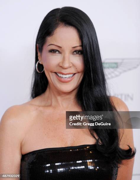 Actress Apollonia Kotero arrives at the 21st Annual Race To Erase MS Gala at the Hyatt Regency Century Plaza on May 2, 2014 in Century City,...