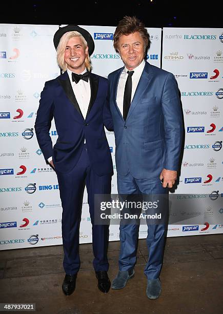 Christian Wilkins and Richard Wilkins arrive at the Cure Brain Cancer Foundation Mad Hatter Ball on May 3, 2014 in Sydney, Australia.