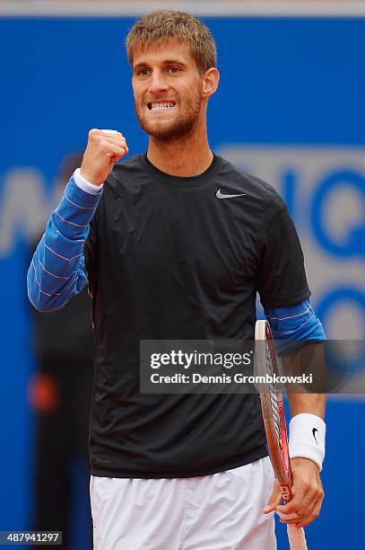 Martin Klizan of Slovakia celebrates a point during his match against Tommy Haas of Germany during the BMW Open on May 3, 2014 in Munich, Germany.