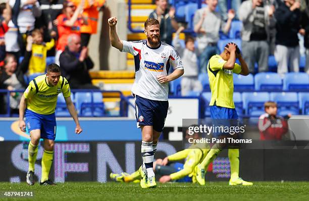 Despair for Birmingham City players as Matthew Mills of Bolton Wanderers celebrates as Lee Chung-Yong of Bolton Wanderers scores their first goal...