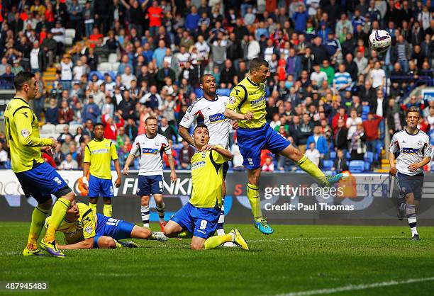 Paul Caddis of Birmingham City scores their second goal with a header to equalise during the Sky Bet Championship match between Bolton Wanderers and...