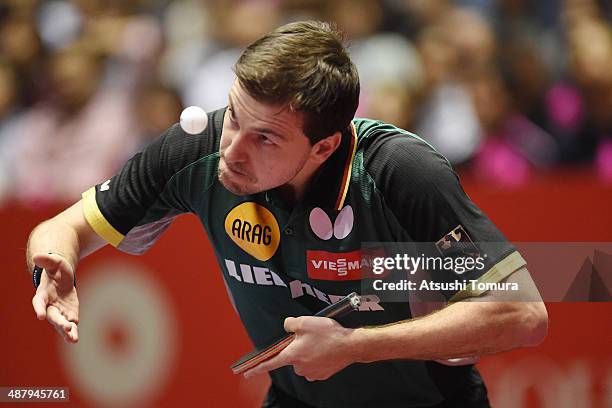 Timo Boll of Germany serves against Ning Gao of Singapore during day six of the 2014 World Team Table Tennis Championships at Yoyogi National...