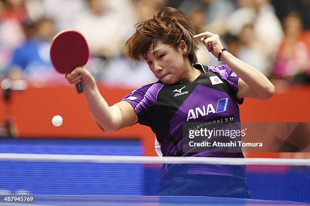 Yuka Ishigaki of Japan plays a forehand against Jie Li of Netherlands during day six of the 2014 World Team Table Tennis Championships at Yoyogi...