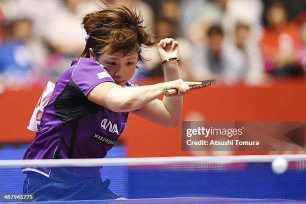 Yuka Ishigaki of Japan plays a forehand against Jie Li of Netherlands during day six of the 2014 World Team Table Tennis Championships at Yoyogi...