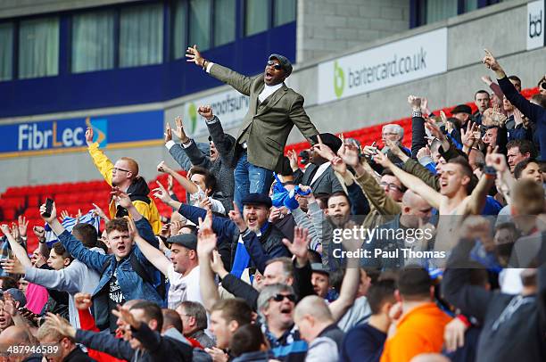 Birmingham City fans celebrate as they avoid relegation after the Sky Bet Championship match between Bolton Wanderers and Birmingham City at Reebok...