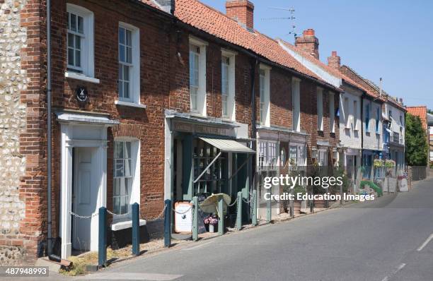 Upmarket shops in the fashionable village of Burnham Market on the north Norfolk coast, England.