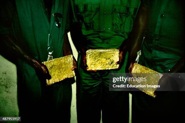 Three gold bars equaling one million dollars of pure gold. The Ashanti Goldfields in Obouasi in the Ashanti Region of Ghana, West Africa. The Ashanti...