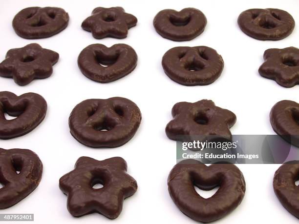 Chocolate covered gingerbread shapes.