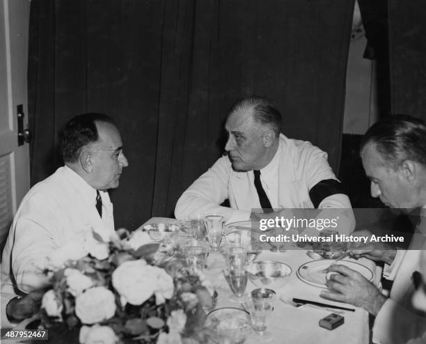 President Roosevelt and President Vargas. President Getulio Vargas of Brazil confers with President Roosevelt at a conference aboard a U.S. Destroyer...