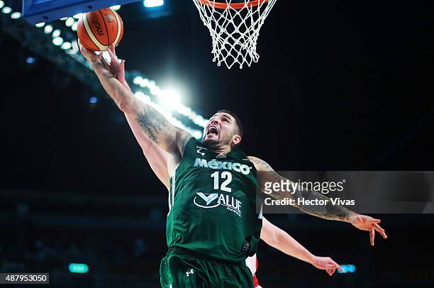 Hector Hernandez of Mexico goes up against Kelly Olynyk of Canada during a third place match between Canada and Mexico as part of the 2015 FIBA...