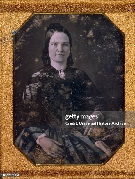 Mary Todd Lincoln, wife of Abraham Lincoln. Three-quarter length portrait, seated, facing front, by Nicolas Shepherd, photographer Published: 1847