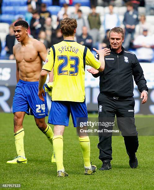 Tom Adeyemi and Jonathan Spector of Birmingham City celebrate with Lee Clark manager of Birmingham City as they avoid relegation after the Sky Bet...