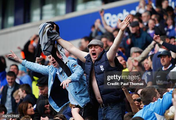 Birmingham City fans celebrate as they avoid relegation after the Sky Bet Championship match between Bolton Wanderers and Birmingham City at Reebok...