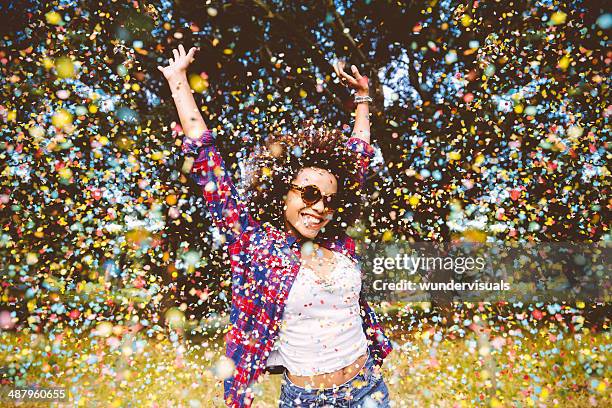 hipster enjoying confetti - black people party stock pictures, royalty-free photos & images