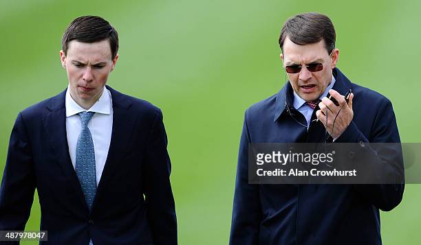 Jockey Joseph O'Brien with his trainer father Aidan O'Brien at Newmarket racecourse on May 03, 2014 in Newmarket, England.