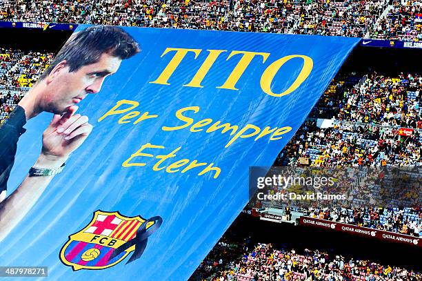 Barcelona fans display a huge banner in memory of former FC Barcelona head coach Tito Vilanova prior to the La Liga match between FC Barcelona and...