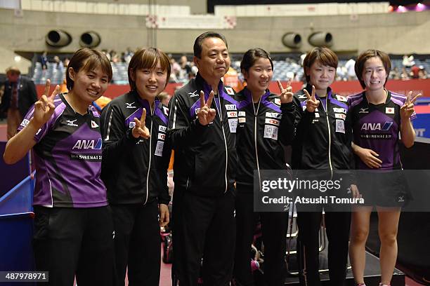 Sayaka Hirano, Saki Tashiro, Yasukazu Murakami head coach, Sakura Mori, Yuka Ishigaki and Kasumi Ishikawa of Japan pose for photographers after the...