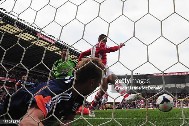 Peter Odemwingie of Stoke City scores during the Barclays Premier League match between Stoke City and Fulham at the Britannia Stadium on May 3, 2014...