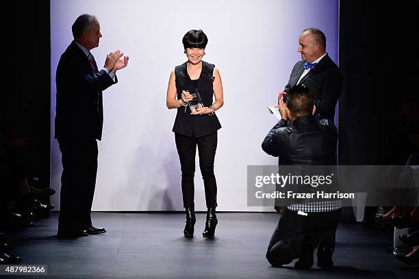 Fashion Designer Son Jung Wan walks the runway holding her Silver Needle Award: Son Jung Wan Spring 2016 during New York Fashion Week: The Shows at...