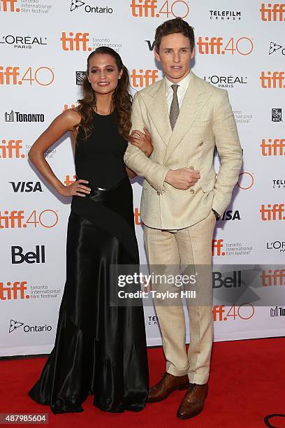 Alicia Vikander and Eddie Redmayne attend the premiere of "The Danish Girl" at Princess of Wales Theatre during the 2015 Toronto International Film...