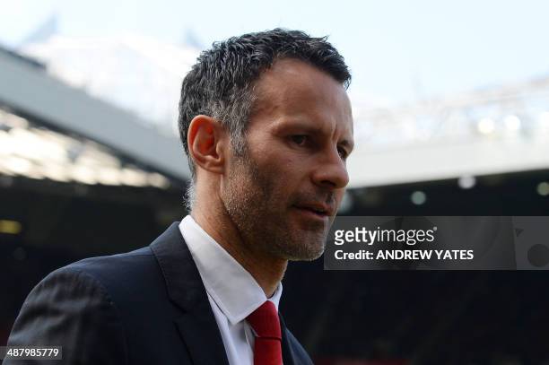 Manchester United's Welsh caretaker manager Ryan Giggs arrives before the English Premier League football match between Manchester United and...