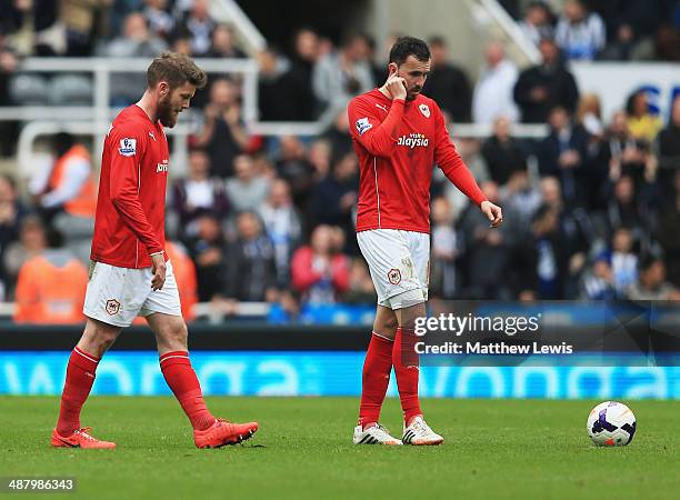 Aron Gunnarsson and Jordon Mutch of Cardiff City look dejected during the Barclays Premier League match between Newcastle United and Cardiff City at...