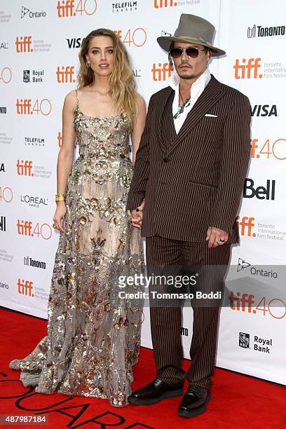 Actors Amber Heard and Johnny Depp attend "The Danish Girl" premiere during the 2015 Toronto International Film Festival held at the Princess of...