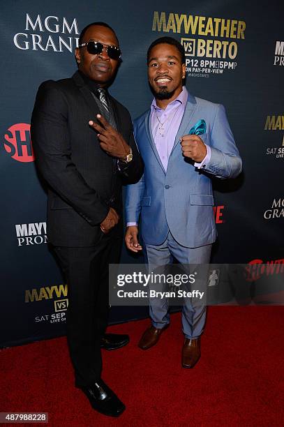Boxing trainer Kenny Porter and boxer Shawn Porter arrive at the VIP Pre-Fight Party for 'High Stakes: Mayweather v. Berto' presented by Showtime at...