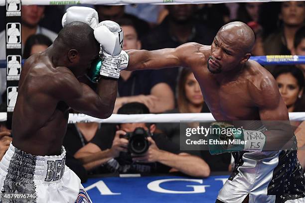 Floyd Mayweather Jr. Throws a right at Andre Berto during their WBC/WBA welterweight title fight at MGM Grand Garden Arena on September 12, 2015 in...