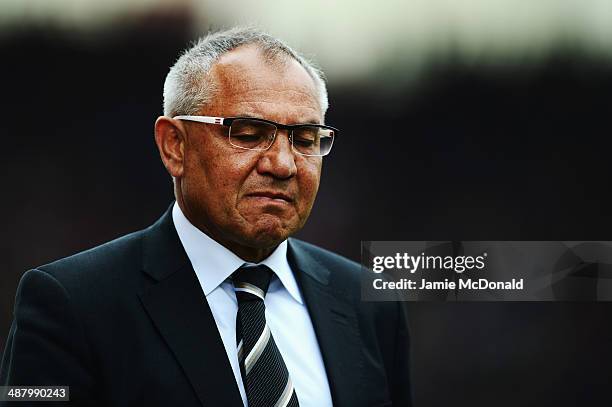 Fulham manager Felix Magath reacts as his side are relegated following their defeat in the Barclays Premier League match between Stoke City and...