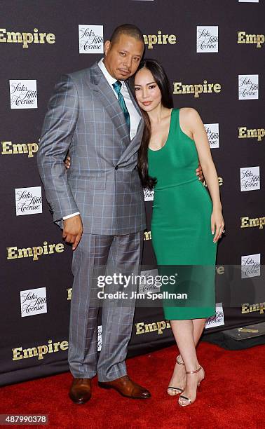 Actor Terrence Howard and Mira Pak attend the "Empire" curated collection unveiling at Saks Fifth Avenue on September 12, 2015 in New York City.