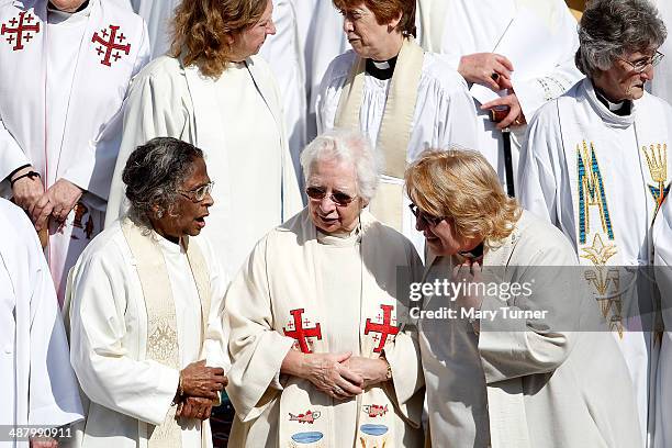 Group of women priests stand among hundreds on the steps of St Paul's Cathedral before going inside for a special service with Justin Welby, the...